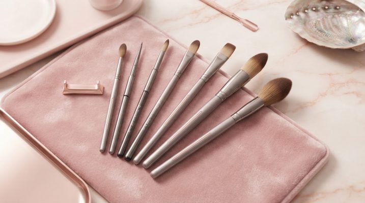 Assortment of professional Kolinsky nail brushes for acrylics displayed elegantly.